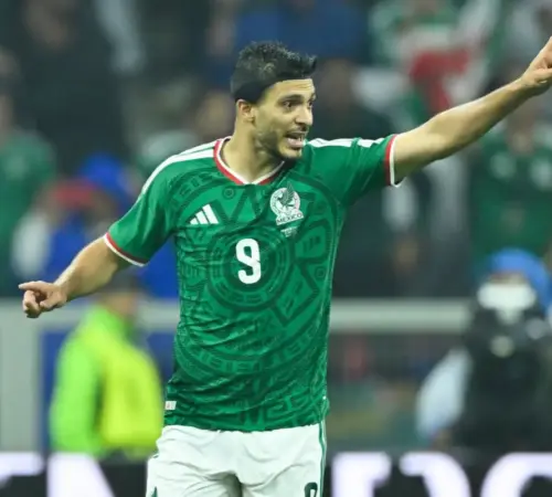 mexicoinglaterramundial Mundial 2026 México cae 2 3 ante Inglaterra y se despide en Octavos de Final | Soccer player in a green Mexico jersey with number 9 celebrates a goal pointing with his right arm on the field
