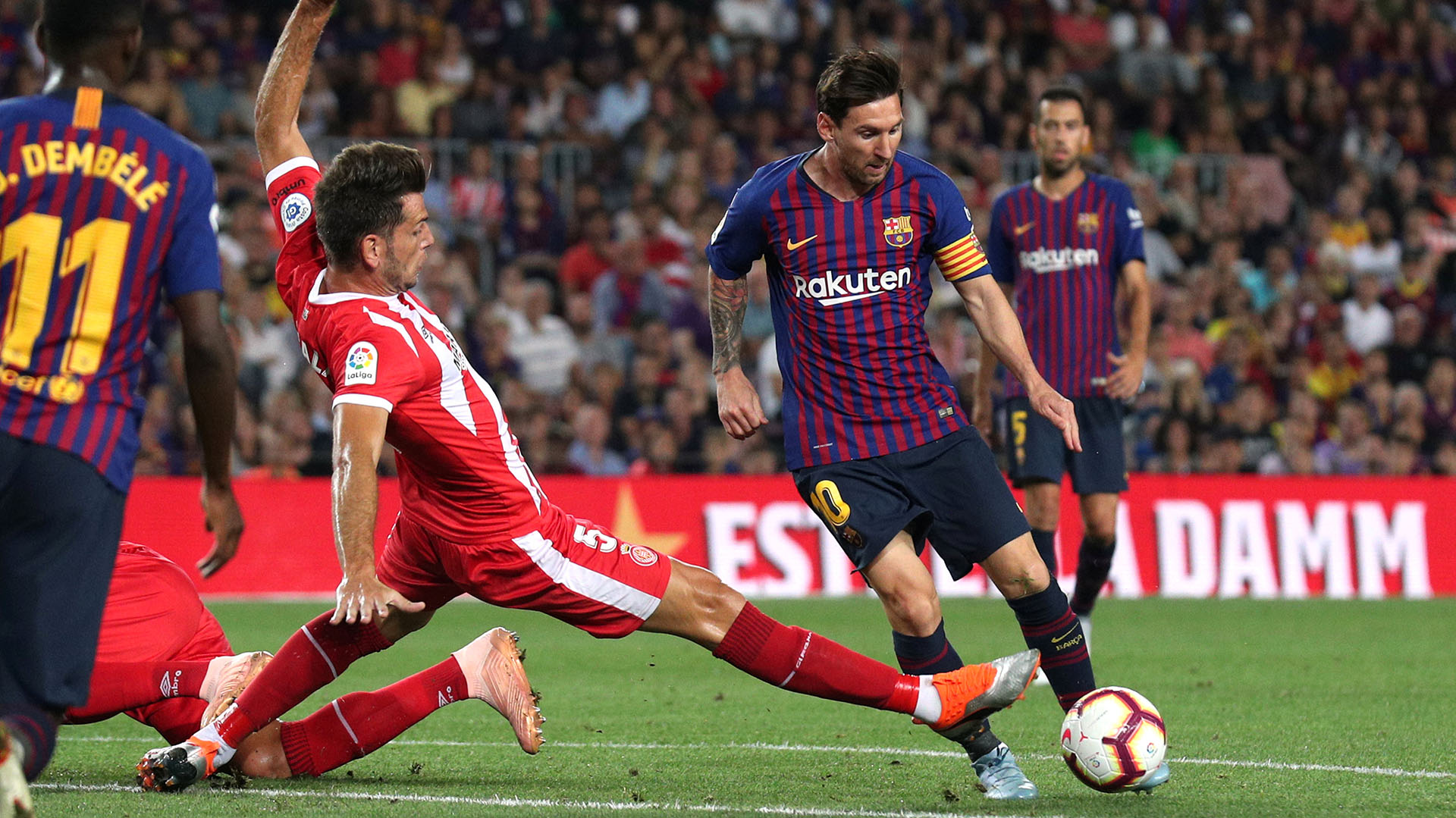 Soccer Football – La Liga Santander – FC Barcelona v Girona – Camp Nou, Barcelona, Spain – September 23, 2018   Barcelona’s Lionel Messi in action with Girona’s Pedro Alcala    REUTERS/Albert Gea