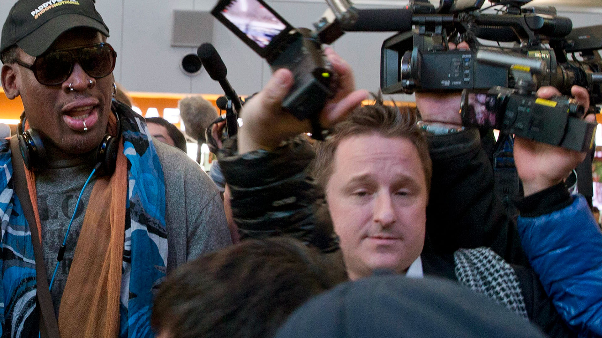 Michael Spavor con Rodman (AP)