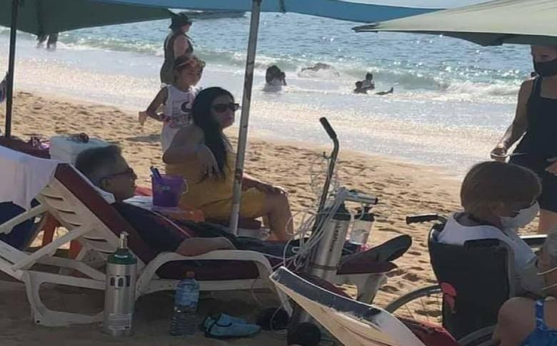 Turistas abarrotan las playas con todo y tanques de oxígeno