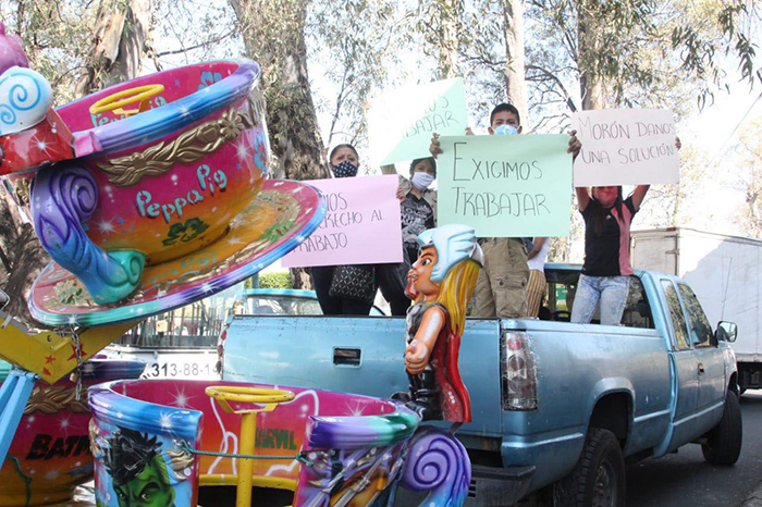 En vivo | Con juegos mecánicos y hasta con imágenes religiosas, comerciantes exigen Caña Fest