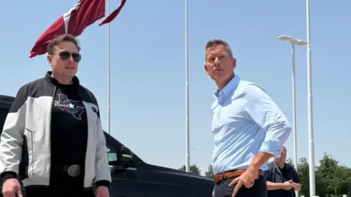 Imagen que representa la desaparición de programadores ante el avance de la inteligencia artificial generando código automáticamente en una oficina tecnológica moderna.